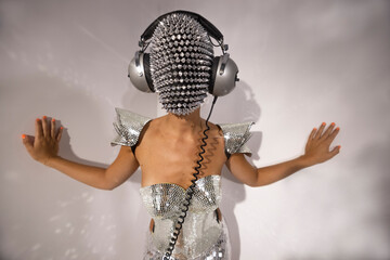 Mrs disco woman with sparkly face and headphones