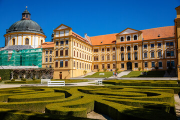 Obraz premium Jaromerice nad Rokytnou, Bohemia, Czech Republic, 06 July 2021: Baroque romantic chateau with park, medieval renaissance castle at summer sunny day, geometrically trimmed green bushes in garden