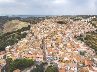 Obraz premium Pomarico town, Basilicata, Italy. aerial view of the old town. vintage post production