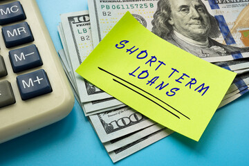 Financial concept about SHORT TERM LOANS with inscription on the page.