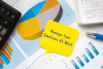 Financial concept meaning Manage Your Emotions At Work with phrase on the sheet.