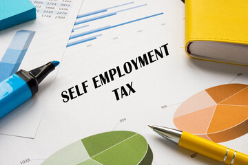 Financial concept meaning SELF EMPLOYMENT TAX with sign on the sheet.