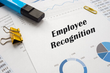  Employee Recognition sign on the piece of paper.