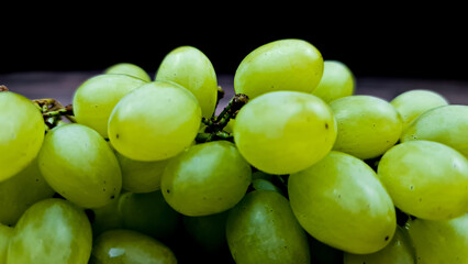 The Natural fresh green grapes close-up. Bunch of grapes.
