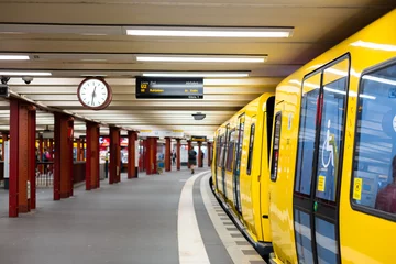 Tuinposter Modern subway. Yellow train at the station © Kate