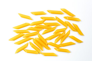 Fototapeta premium Raw uncooked Italian penne rigate pasta isolated on white background
