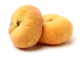 chinese flat peaches on white background 