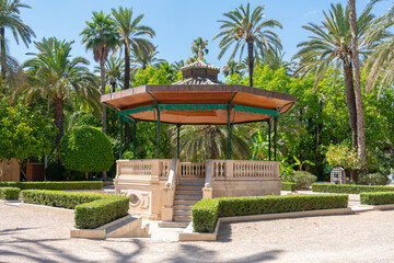 Templete in the Municipal Park of Elche, province of Alicante, Valencian Community. Spain. Europe. The largest date forest in Europe, with almost 200,000 palm trees in gardens throughout the city.
