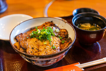 popular bowl of rice covered with pork served in the restaurant in chichibu in saitama prefecture, japan