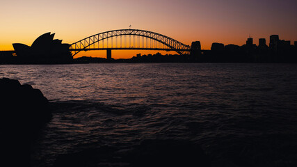 Fototapeta na wymiar Sydney Harbour iconic silhouettes during dusk.