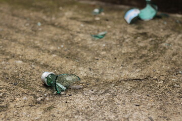 Broken glass bottle in the street