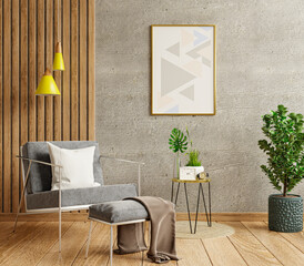 Mockup poster frame in a modern living room with an empty concrete wall.