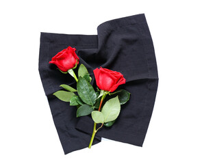 Beautiful roses and napkin on white background