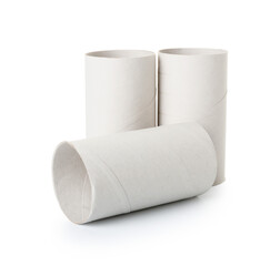 Empty cardboard tubes on white background