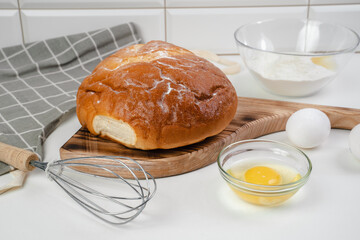 Cooking bread in the kitchen. Eggs, flour, bread close-up