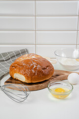 Cooking bread in the kitchen. Eggs, flour, bread close-up