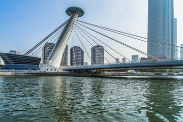 Bridge,City scenery and modern architecture skyline by the Haihe River in Tianjin, China