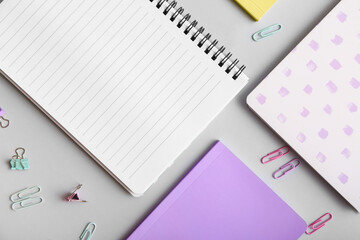 Set of stationery supplies on grey background, closeup