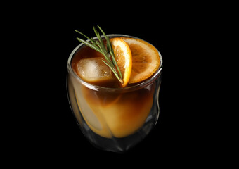 Glass of tasty coffee with orange juice on dark background