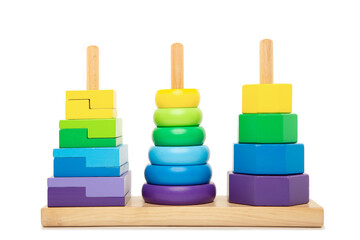 Bright coloured stacking toy for toddlers front view. Concept of Montessori kindergarten, Waldorf kindergarted, Early Childhood Eduation, Special needs education. Isolated background. Isolated