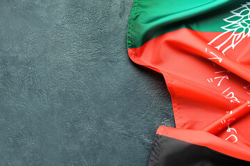 Flag of Afghanistan on dark background