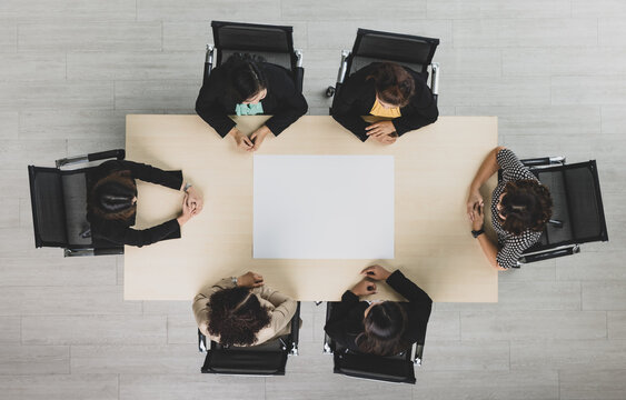 Top View Of Meeting Conference Wooden Table With Six Executives Businesswomen Sitting On Each Chairs Discussing And Talking Business In Team Work In Meeting Room