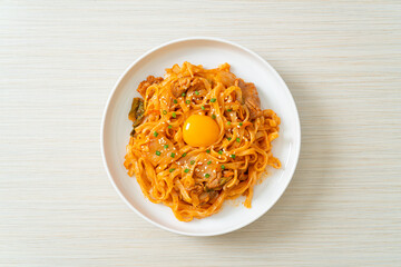 stir-fried udon noodles with kimchi and pork