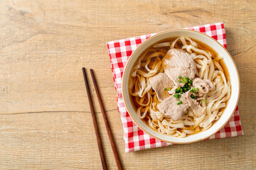 homemade udon noodles with pork in soy or shoyu soup