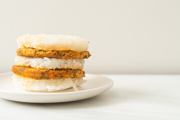 grilled spicy pork and herbs with  sticky rice burger