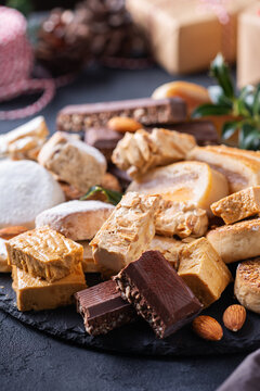 Typical Spanish Christmas sweets, shortbread mantecados, polvorones, nougat or turron