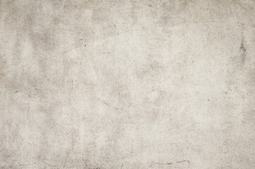 Cracked old cement wall background. Close up of antique concrete texture backdrop.