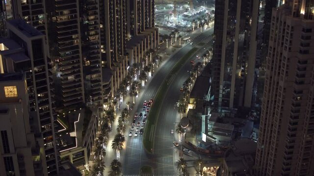 Nighttime Skyline Of Dubai With Illuminated Skyscrapers