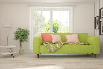 White living room with sofa and summer landscape in window. Scandinavian interior design. 3D illustration