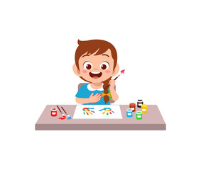 cute little girl using paint to hand for art