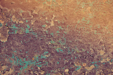 The grunge background is multicolored. Vintage old metal texture. Abstract terrible backdrop