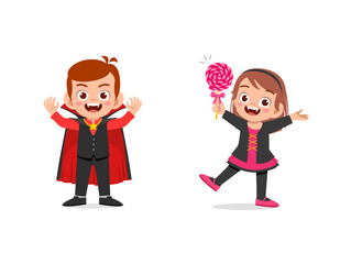 boy and girl celebrate halloween wear vampire costume