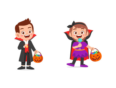 boy and girl celebrate halloween wear vampire costume