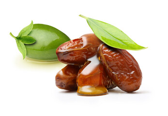 Jojoba oil on seeds isolated on white background