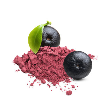 Red matcha tea. Two acai berries and powder isolated on white background.