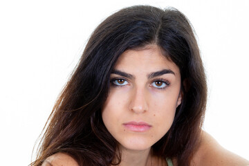 young beautiful woman serious face portrait posing camera shot on white background