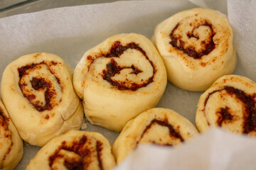 making cinnamon rolls in progress