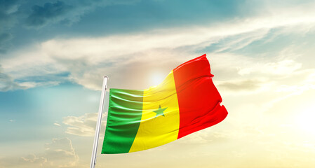 Senegal national flag cloth fabric waving on the sky - Image