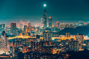 city skyline at night wuth Taipei 101