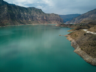 Drone view of the Gunib reservoir and the surrounding mountains. The Republic of Dagestan. Russia.