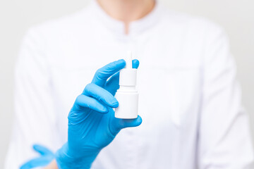 Fototapeta premium the doctor holds a nasal spray