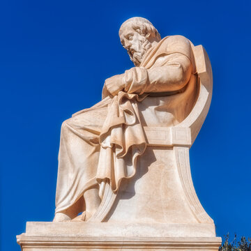 Plato the ancient Greek philosopher statue under blue sky, Athens Greece