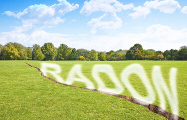 A green mowed lawn with a diagonal crack with radon gas escaping - concept image with copy space