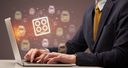 Hand searching for recipes on the internet