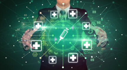 Fototapeta premium Hand holding healthcare icons concept