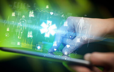 Close-up of a touchscreen with healthcare icons